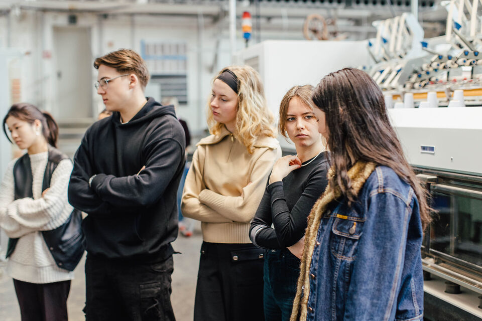 Students in the machine hall at the Faculty of Textile and Clothing Technology