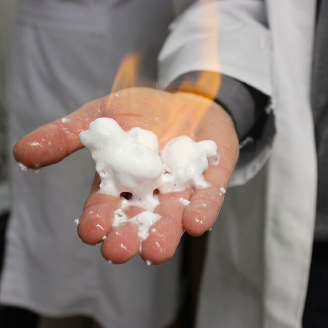 Burning gas hydrate on hand; Lab Professor Heyko Schultz Burning Hydrate on Hand; Lab Professor Heyko Schultz