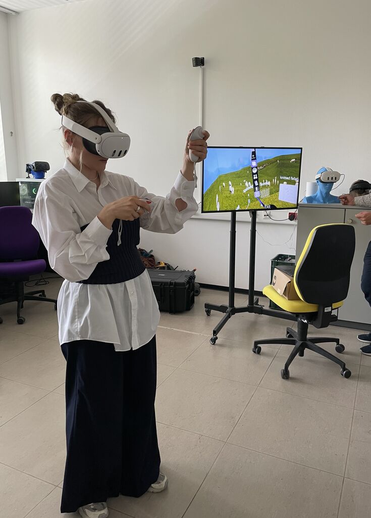 Student wearing VR glasses Credit: M.E. Wachs