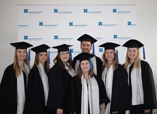 Promovierende auf ihrem Abschluss