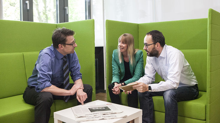 Three people in a counseling situation